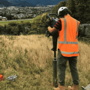 Digger extracting aggregate from an onsite job